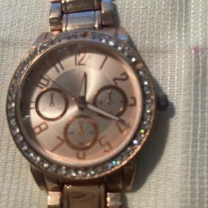 Woman's gold bracelet watch